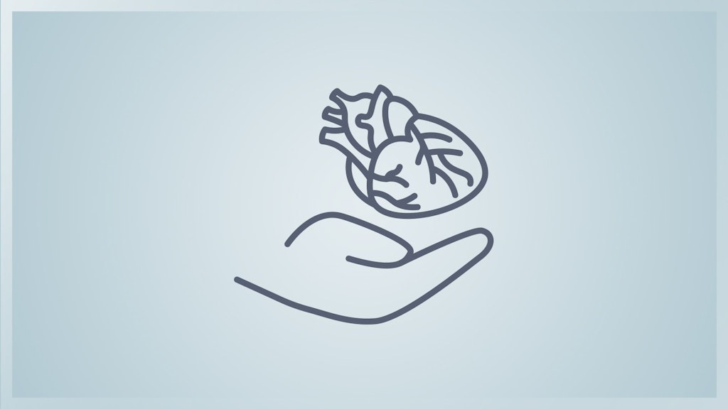 une main ouverte sous un cœur humain.