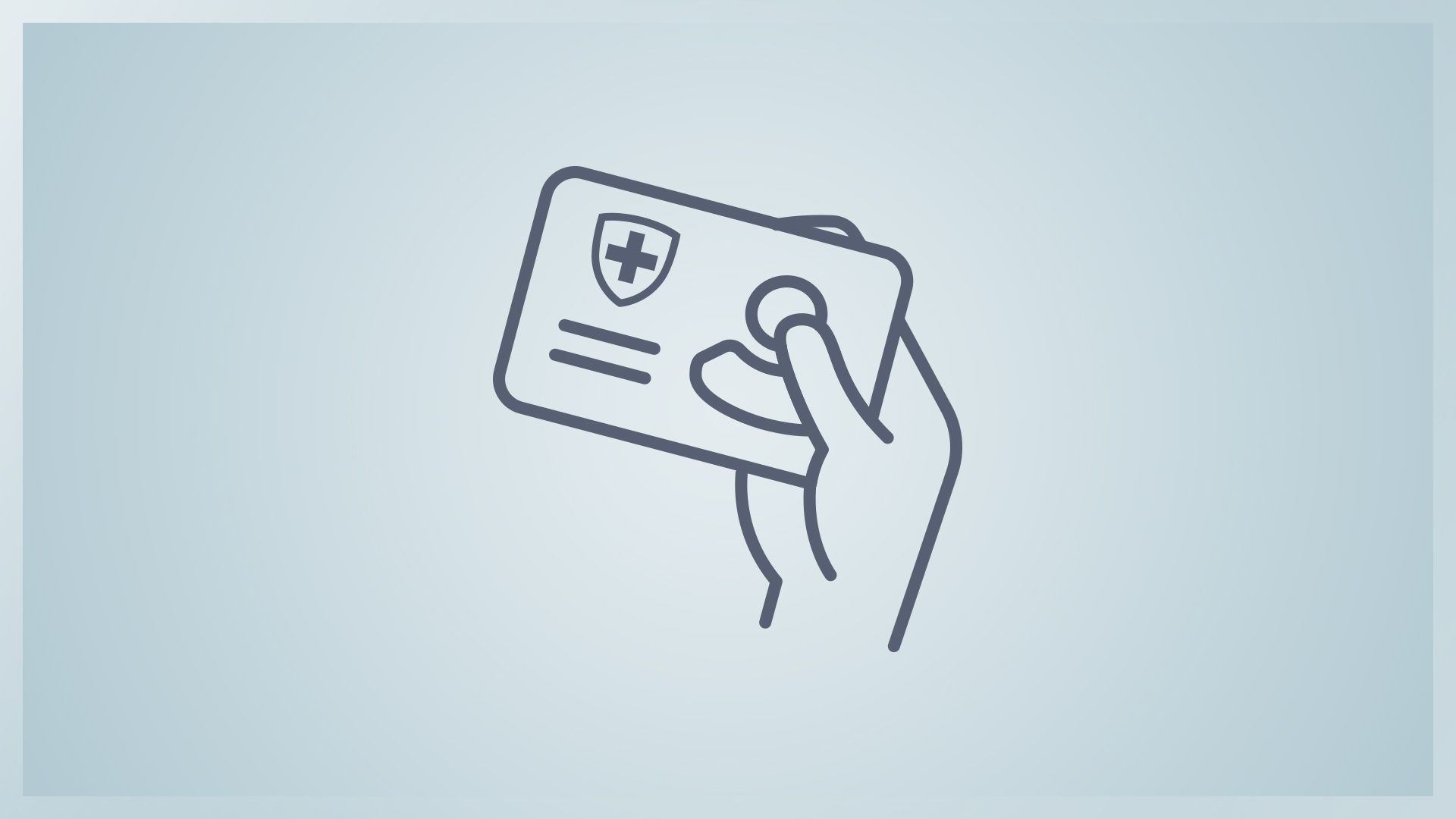 hand holding an insurance card.
