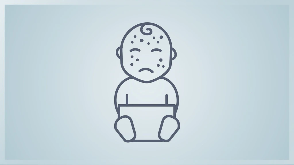 un bébé avec des boutons.