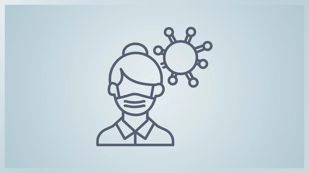 une personne portant un masque et un virus.