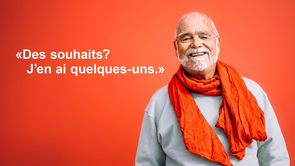Homme âgé à l'air satisfait. Image accompagnée de la citation : « Mes souhaits ? J'en ai quelques-uns. »